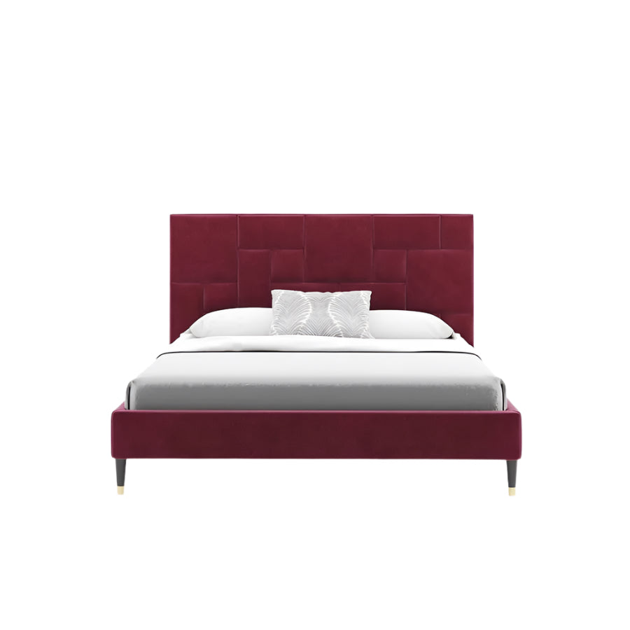 Celine kingsize bed with burgundy upholstery, geometric headboard, and gold-tipped legs