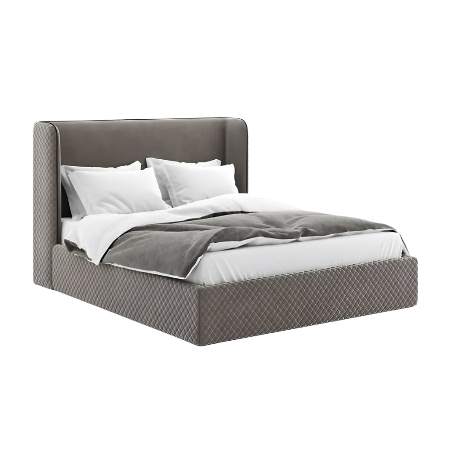 Aldo bed with high upholstered headboard, quilted base, and white bedding