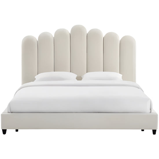 Camille double bed with scalloped headboard and white bedding